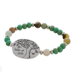 Stretch beaded bracelet with tree of life engraved